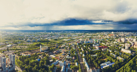 Obraz premium Panorama of the Kirov city and pioneer palace in Leninsky district in the central part of the city of Kirov on a summer day against the backdrop of thunderstorms and storms