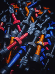 colored tubeless presta valves. bicycle tubeless rim valve stems background