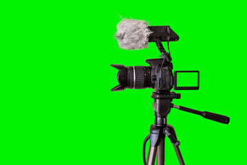 camera isolated on green background. Green screen background. Video blog concept. video camera.