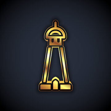 Gold Mosque tower or minaret icon isolated on black background. Vector