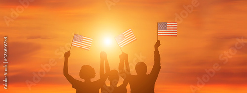 USA flag on sky background. American holidays