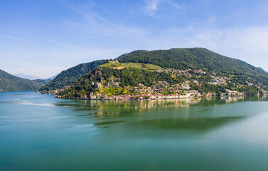 Stunning panorama of the Lake Lugano and the Morcote village on a sunny summer day in Canton Ticino in Switzerland