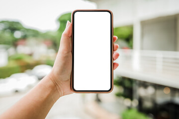 Women's hands holding cell telephone blank copy space screen. smart phone with technology concept