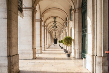 Areas covered by arches at both sides of the commerce square in Lisbon Portugal