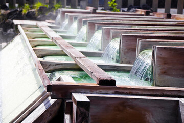 Yubatake onsen, hot spring wooden boxes with mineral water in Kusatsu onsen, Gunma prefecture, Japan