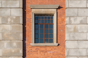 Fototapeta na wymiar window in brick wall. Architectural element of the building