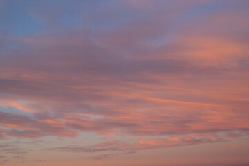 Pink coloured sky at dawn time.