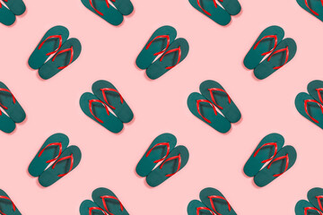 Green flip flops on pink background seamless pattern. Travel, summer vacation minimalistic concept