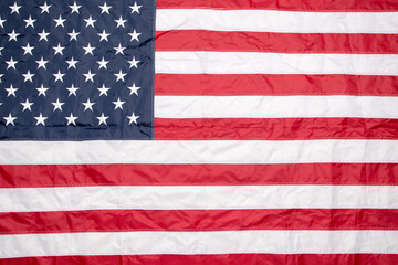 Naklejka premium Fabric flag of United States of America background