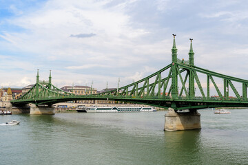 Landscape with Liberty Bridge (Szabadság híd) over Danube river in Budapest, Hungary .