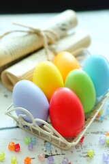 Close up of Colorful Easter Eggs on white wooden background.