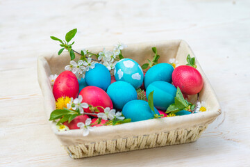 Colorful Easter eggs on wooden background