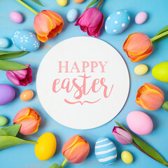Easter holiday background with easter eggs and tulip flowers on wooden table. Greeting card mockup