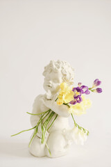 The girl's hands are holding a beautiful bouquet of flowers.
isolated on white background. flower composition