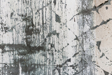 Closeup fragment of grunge weathered wall of a building