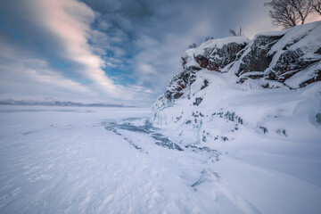 The frozen lake Torneträsk in Swedish Lapland. Beautiful ice forms create an amazing sight.