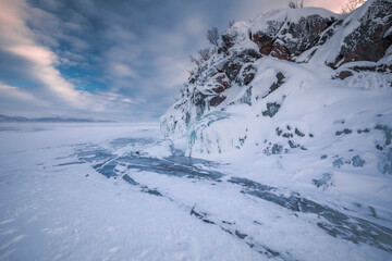 Obraz premium The frozen lake Torneträsk in Swedish Lapland. Beautiful ice forms create an amazing sight.