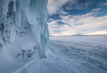 The frozen lake Torneträsk in Swedish Lapland. Beautiful ice forms create an amazing sight.