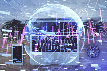 Multi exposure of financial chart drawing over table background with computer. Concept of research and analysis. Top view.