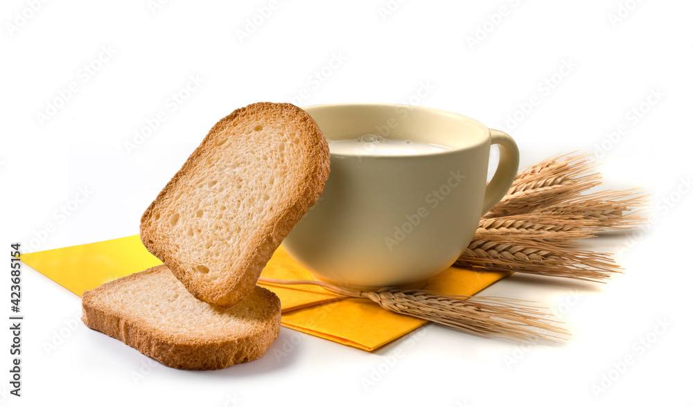 Wall mural breakfast set with cup of milk, rusks and ears of wheat, and yellow towel