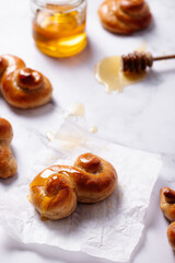 Homemade fresh baked traditional Czech sweet buns called Juda's ropes or Jidáše in Czech