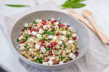 healthy spring salad with asparagus, barley and cheese