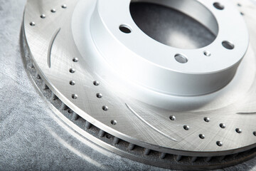 improved Perforated brake discs on dark gray background