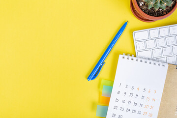Naklejka na ściany i meble closing month calendar for 2021 on yellow background, planning a business meeting or travel planning concept