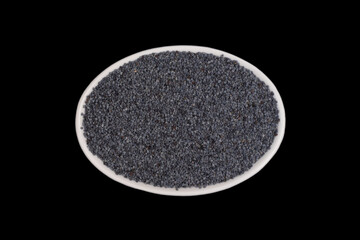 poppy seeds in a small white, oval ceramic bowl
