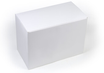 Closed white rectangular cardboard packing box on a white surface