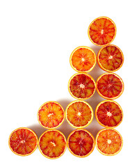 Blood oranges isolated on white background. Sliced fruit studio shots.