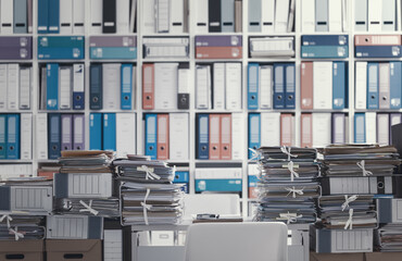 Stacks of paperwork in the office