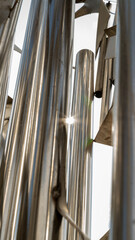 abstract image of stainless steel tube viewed horizontally.