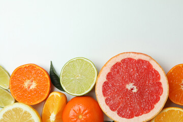 Fresh citrus on white background, space for text