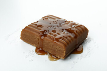 Delicious salted caramel isolated on white background