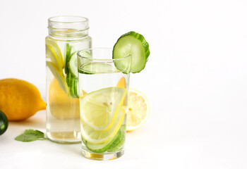 Fototapeta premium A glass of detox and fruit are on the table.