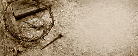 Crucifixion Of Jesus Christ. Cross With three Nails And Crown Of Thorns on ground. - obrazy, fototapety, plakaty
