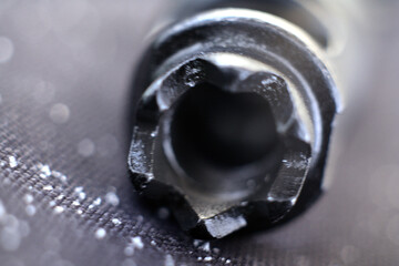 The muzzle of a rifle. Close-up view.
