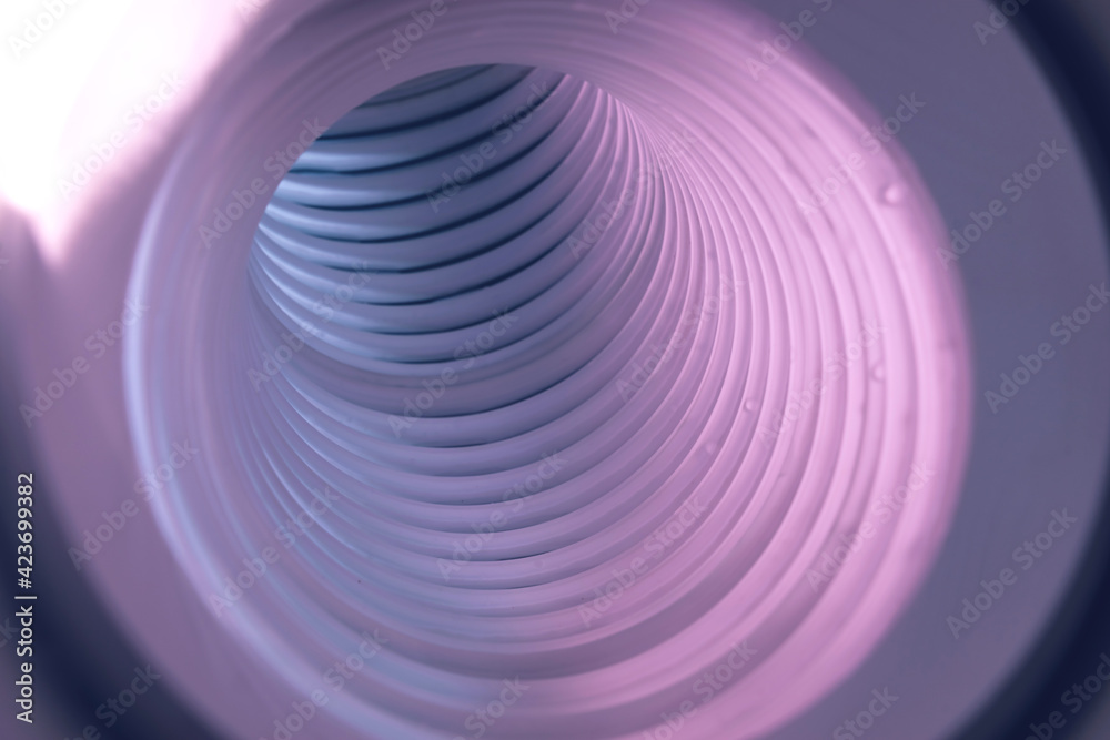 Poster Beautiful round abstract gray tunnel with color light on a background pattern textured ford design.