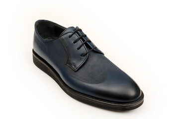 Elegant handmade leather shoes on a white background