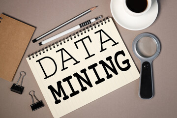 data mining. text on white paper on brown background