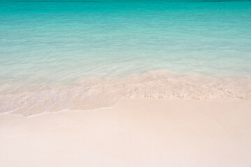 Fototapeta na wymiar Sand and caribbean tropical beach, summer background with copy space