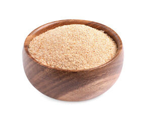 Fresh bread crumbs in wooden bowl isolated on white