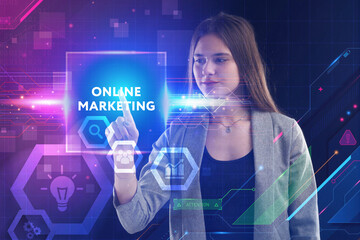 Business, Technology, Internet and network concept. Young businessman working on a virtual screen of the future and sees the inscription: Online marketing