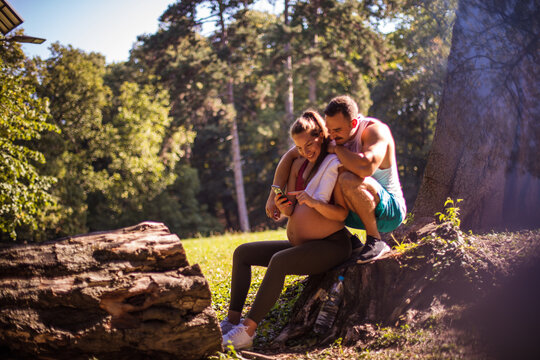 Couple using mobile.