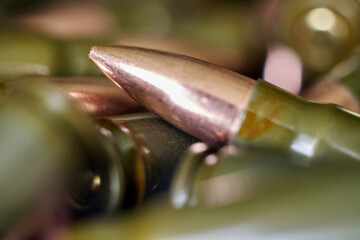 Live ammunition for automatic weapons or rifles ranked. Close-up view.
