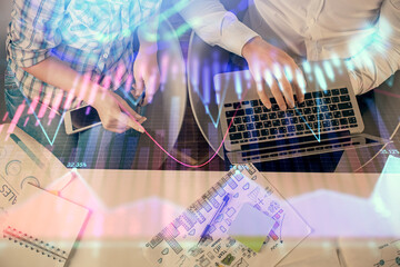 Multi exposure of man and woman working together and forex graph hologram drawing. Financial analysis concept. Computer background. Top View.