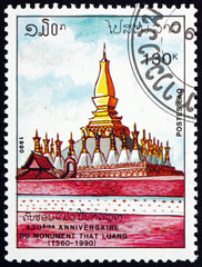 Fototapeta premium Postage stamp Laos 1990 That Luang temple