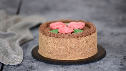 Homemade Kiev cake with buttercream. Ukrainian meringue nut cake.