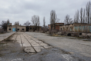 Territory of abandoned industrial area waiting for demolition